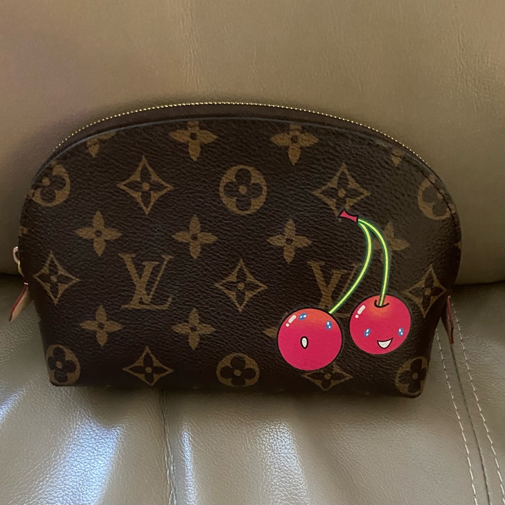 Gently used brown cosmetic case